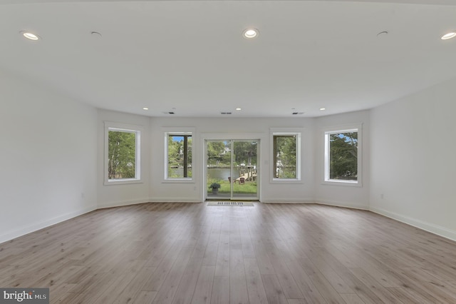 139 Spa Dr, Annapolis, MD 21403 - unfurnished living room with plenty of natural light, baseboards, recessed lighting, and wood finished floors