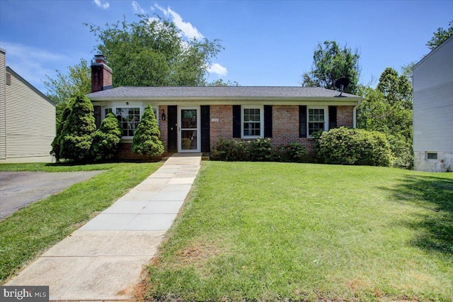 102 Andover Ct, Frederick, MD 21702 - single story home with brick siding, a chimney, and a front yard