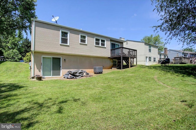 102 Andover Ct, Frederick, MD 21702 - rear view of property featuring a deck, a yard, stairs, and central AC