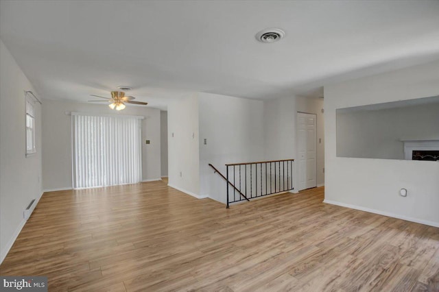 102 Andover Ct, Frederick, MD 21702 - unfurnished room with light wood-type flooring, a ceiling fan, and baseboards