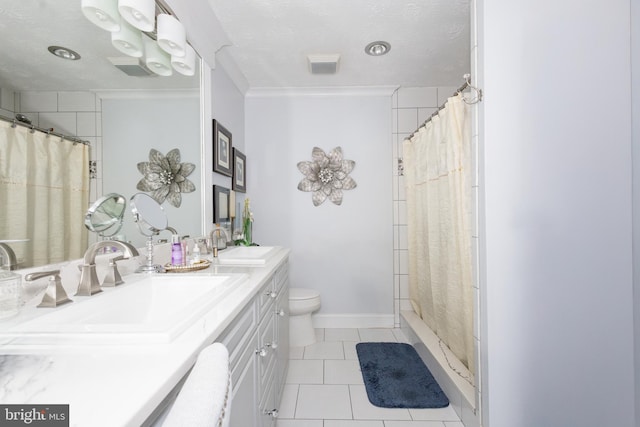 1765 Stone Dr, Huntingtown, MD 20639 - bathroom featuring double vanity, tile patterned flooring, toilet, curtained shower, and a textured ceiling
