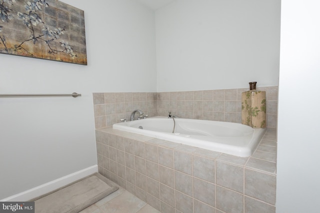 1765 Stone Dr, Huntingtown, MD 20639 - full bathroom featuring a bath and baseboards
