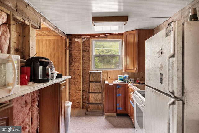 1939 Old Reading Rd Lot 67, 95, Catawissa, PA 17820 - kitchen featuring white appliances, light countertops, and brown cabinetry