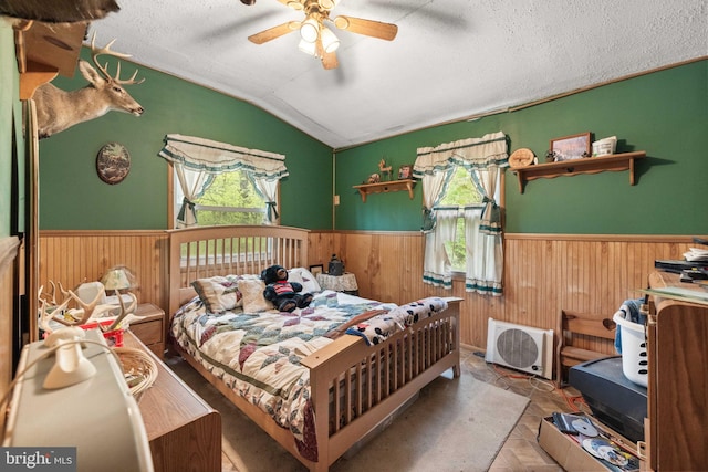 1939 Old Reading Rd Lot 67, 95, Catawissa, PA 17820 - bedroom with wainscoting, wooden walls, lofted ceiling, and a ceiling fan