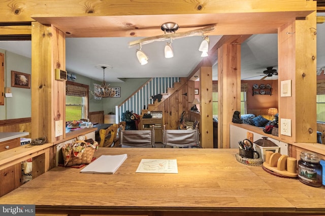 1939 Old Reading Rd Lot 67, 95, Catawissa, PA 17820 - dining space featuring a chandelier, stairs, a ceiling fan, and wood walls