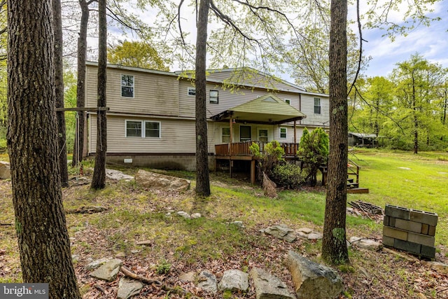 1939 Old Reading Rd Lot 67, 95, Catawissa, PA 17820 - rear view of house with a wooden deck and a lawn