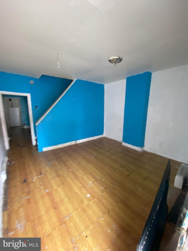 2137 W Toronto St, Philadelphia, PA 19132 - additional living space with hardwood / wood-style floors and baseboards