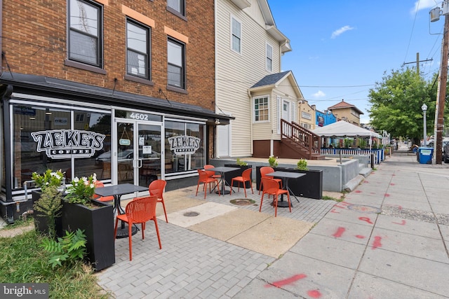 view of patio featuring outdoor dining area