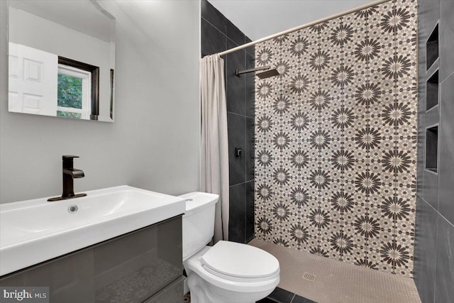 907 Sterling Ct, Herndon, VA 20170 - full bathroom featuring toilet, tiled shower, and vanity