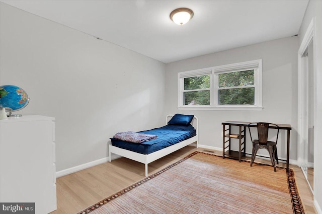 907 Sterling Ct, Herndon, VA 20170 - bedroom featuring wood finished floors and baseboards