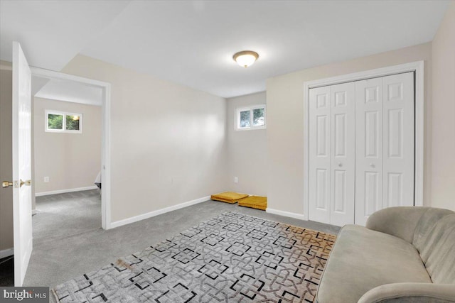 907 Sterling Ct, Herndon, VA 20170 - living area featuring plenty of natural light, carpet floors, and baseboards