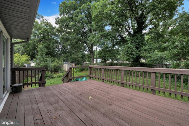 907 Sterling Ct, Herndon, VA 20170 - deck with view of scattered trees and a fenced backyard