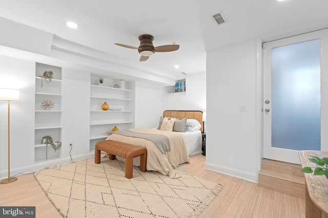 bedroom with baseboards, wood finished floors, recessed lighting, and ceiling fan