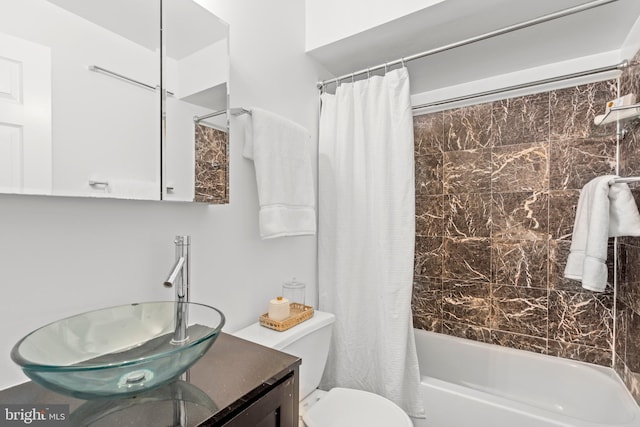 bathroom with toilet, vanity, and shower / bath combination with curtain