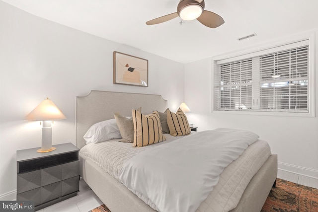 bedroom featuring baseboards