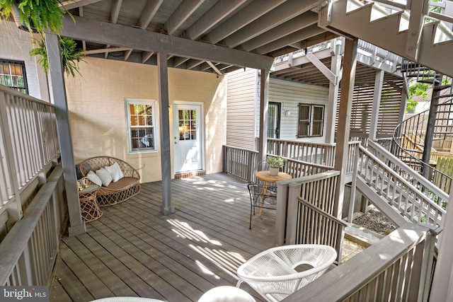 wooden terrace featuring stairway
