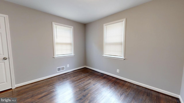 724 Overbrook Rd, Baltimore, MD 21212 - empty room with dark wood-style floors and baseboards