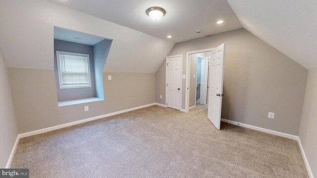 724 Overbrook Rd, Baltimore, MD 21212 - bonus room featuring vaulted ceiling, baseboards, light carpet, and recessed lighting