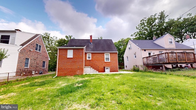 724 Overbrook Rd, Baltimore, MD 21212 - rear view of property featuring brick siding, a deck, and a chimney