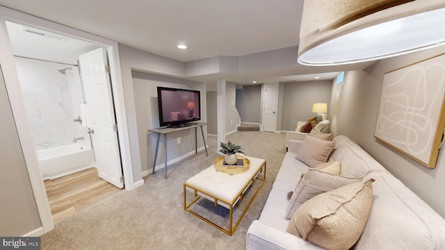 724 Overbrook Rd, Baltimore, MD 21212 - living area featuring light colored carpet, recessed lighting, and baseboards