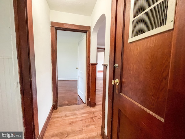 1021 Park Ave, Annapolis, MD 21403 - corridor with light wood-style flooring and arched walkways