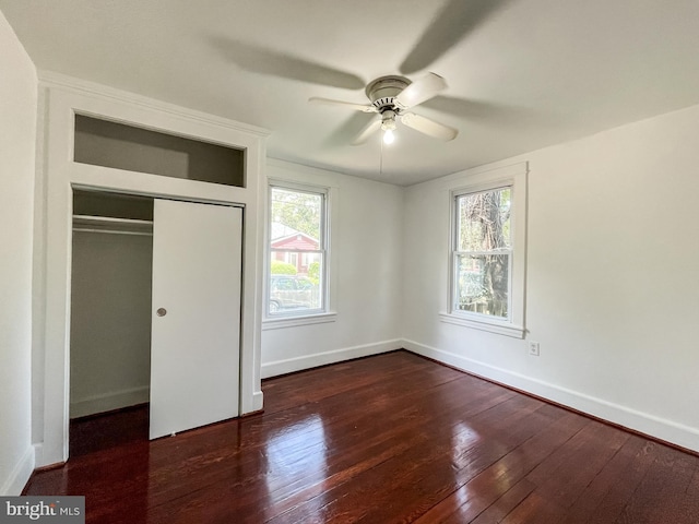 1021 Park Ave, Annapolis, MD 21403 - unfurnished bedroom with hardwood / wood-style floors, multiple windows, and a closet