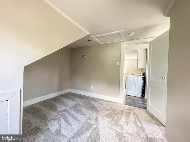 1021 Park Ave, Annapolis, MD 21403 - empty room with carpet, attic access, washer / clothes dryer, and a smoke detector