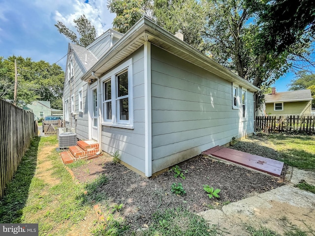 1021 Park Ave, Annapolis, MD 21403 - view of home's exterior featuring a fenced backyard and a chimney