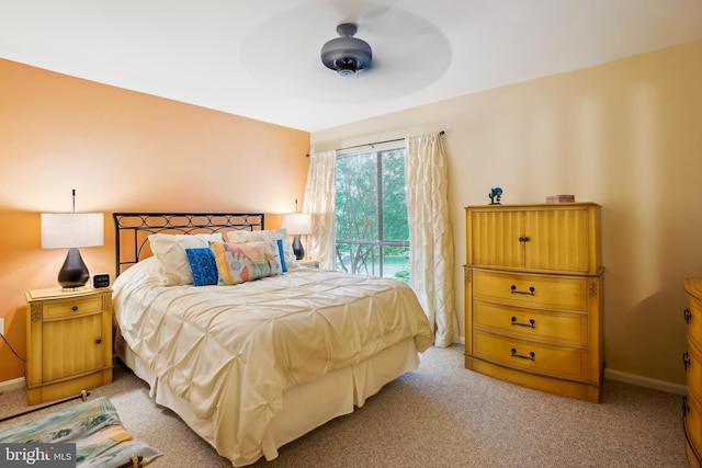 bedroom with access to exterior, light carpet, baseboards, and ceiling fan