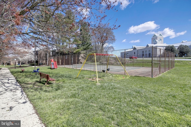 surrounding community featuring fence