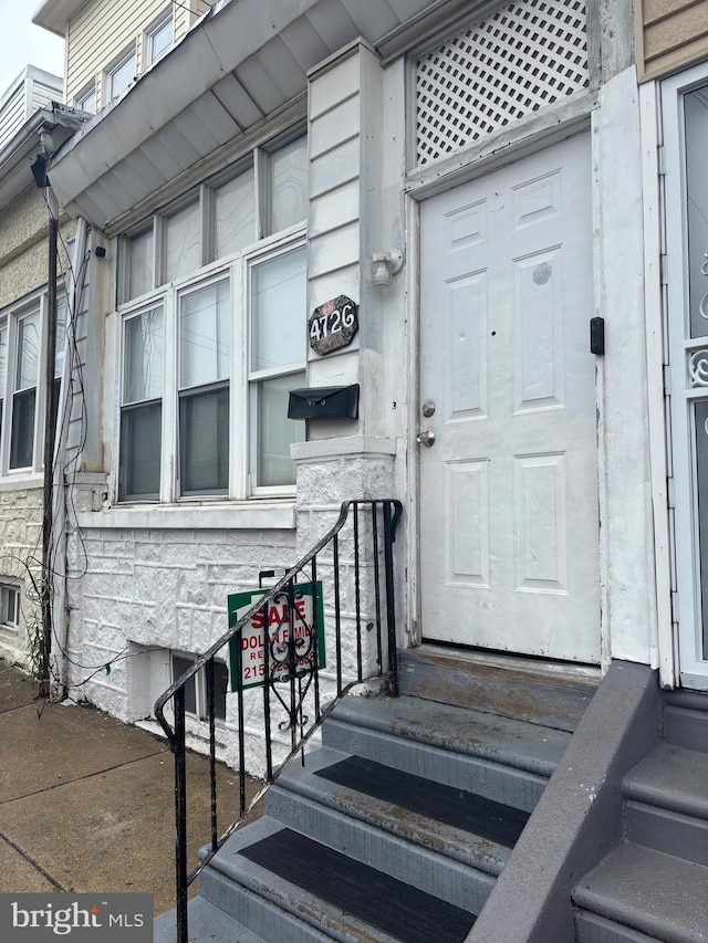 4726 N 2nd St, Philadelphia, PA 19120 - doorway to property featuring stone siding