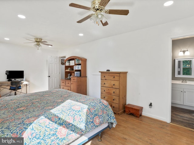 55 Powell Ln, Front Royal, VA 22630 - bedroom with recessed lighting, wood finished floors, baseboards, ceiling fan, and ensuite bath