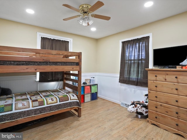 55 Powell Ln, Front Royal, VA 22630 - bedroom with a wainscoted wall, wood finished floors, recessed lighting, and ceiling fan