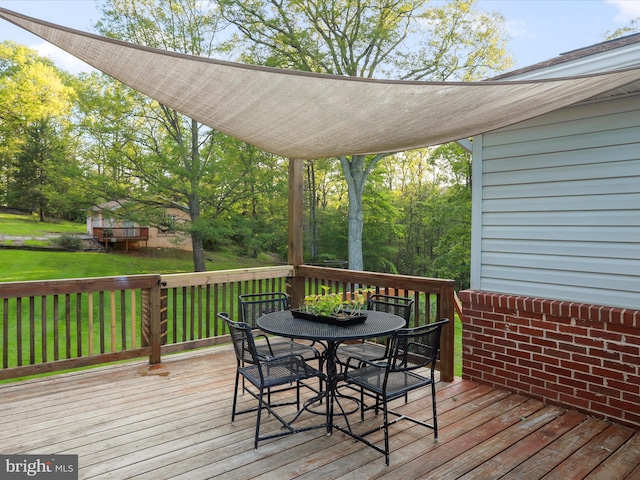 55 Powell Ln, Front Royal, VA 22630 - wooden terrace with outdoor dining space and a lawn