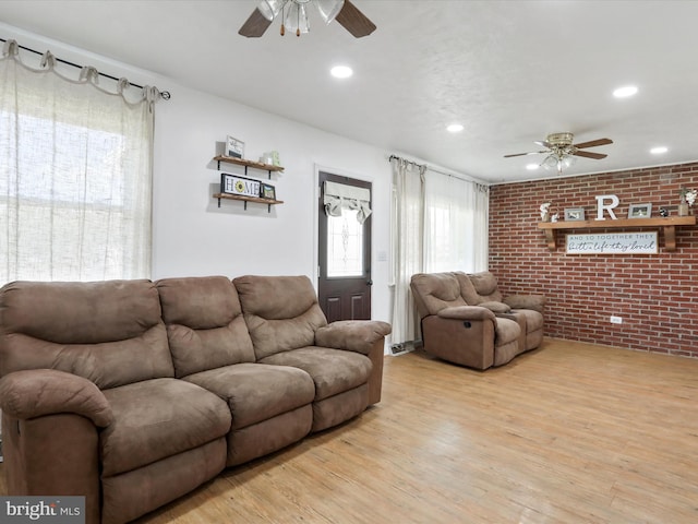55 Powell Ln, Front Royal, VA 22630 - living room featuring a ceiling fan, brick wall, light wood-type flooring, and recessed lighting