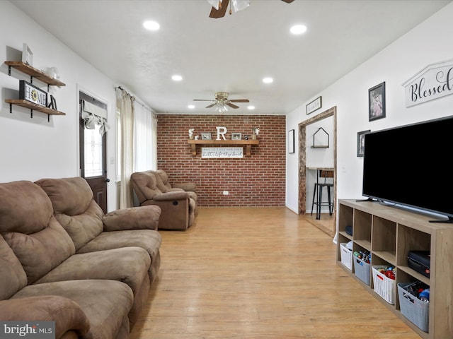 55 Powell Ln, Front Royal, VA 22630 - living area featuring a ceiling fan, brick wall, recessed lighting, and light wood-style floors