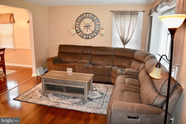 7340 Hasbrook Ave, Philadelphia, PA 19111 - living room with arched walkways, wood finished floors, and baseboards