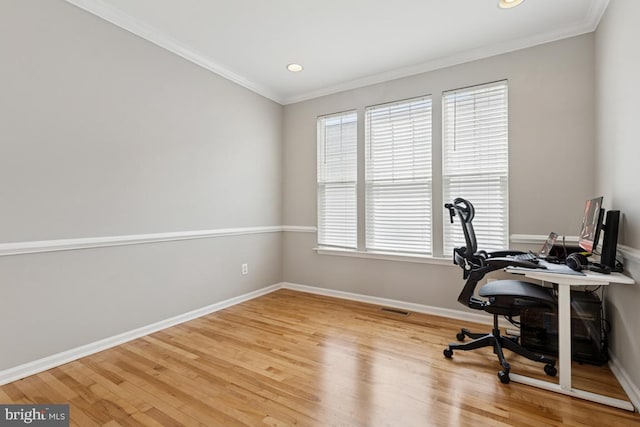 office space with wood finished floors, crown molding, baseboards, and recessed lighting