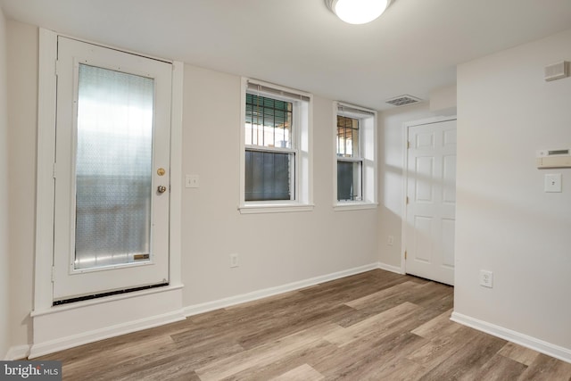 1030 Fairmont St NW Unit T2, Washington, DC 20001 - empty room featuring wood finished floors and baseboards