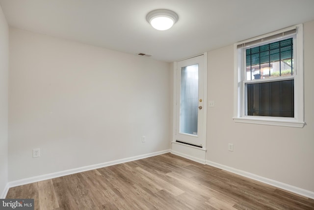 1030 Fairmont St NW Unit T2, Washington, DC 20001 - empty room featuring wood finished floors and baseboards