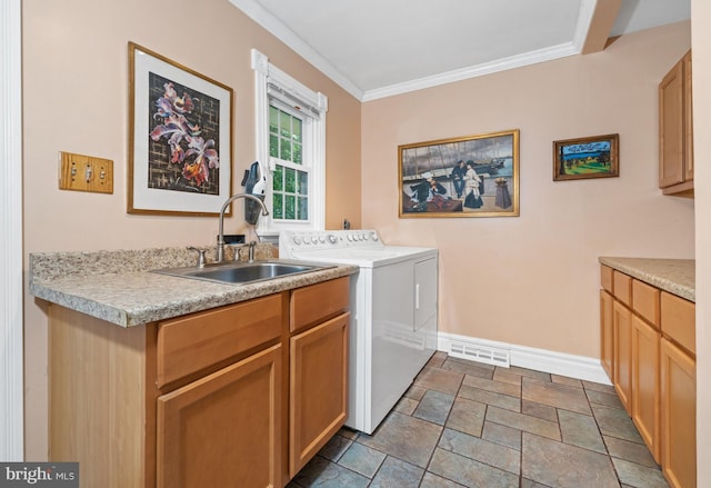 205 Hitching Post Dr, Wilmington, DE 19803 - laundry room with washing machine and clothes dryer, stone finish floors, crown molding, cabinet space, and baseboards