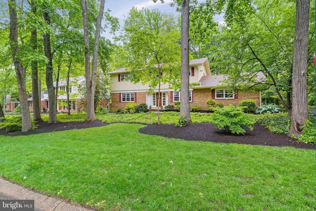 205 Hitching Post Dr, Wilmington, DE 19803 - view of front of house with brick siding and a front lawn