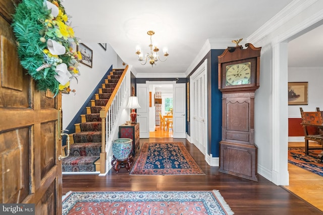 205 Hitching Post Dr, Wilmington, DE 19803 - foyer with stairs, a chandelier, wood finished floors, ornamental molding, and baseboards