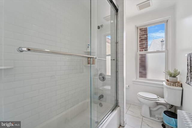 3182 Miller St, Philadelphia, PA 19134 - bathroom featuring toilet, marble look tiles, enclosed tub / shower combo, radiator, and baseboards