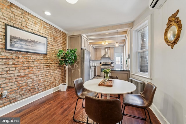 3182 Miller St, Philadelphia, PA 19134 - dining space featuring radiator heating unit, baseboards, brick wall, dark wood-style flooring, and beamed ceiling