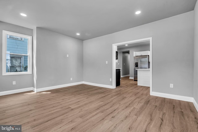 19 E Main St, Salem, NJ 08079 - spare room featuring baseboards, light wood finished floors, and recessed lighting