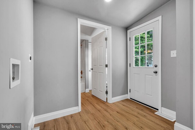 19 E Main St, Salem, NJ 08079 - foyer entrance featuring light wood-style flooring and baseboards