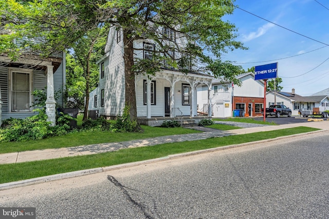 19 E Main St, Salem, NJ 08079 - shotgun-style home with covered porch