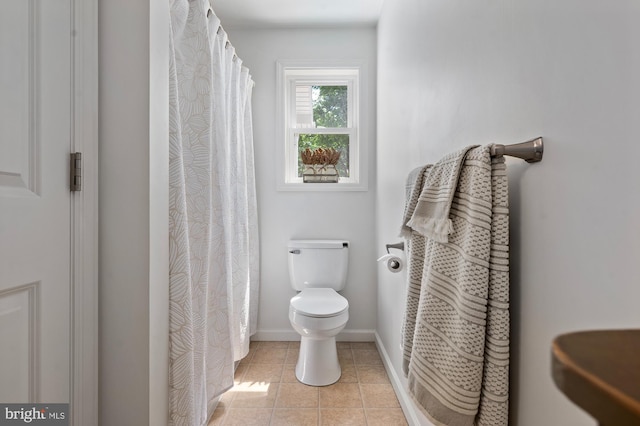 63 W Hanover St, Gettysburg, PA 17325 - full bathroom featuring toilet, tile patterned floors, baseboards, and curtained shower