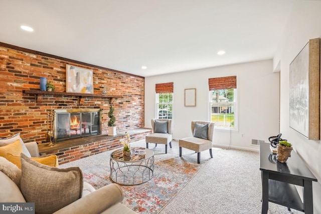 living room with carpet floors, baseboards, recessed lighting, and a fireplace